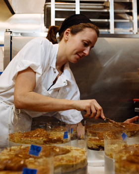 Christina Tosi assembling Apple Pie Layer Cakes