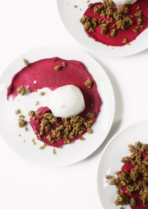 Overhead shot, three white plates with a spiral of Beet-Lime Ganache and nut crunch