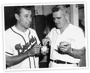 After Game Four Nippy Jones showed Braves equipment manager Joe Taylor the scuff mark left on the baseball from his polished shoes. (DAVID KLUG COLLECTION)