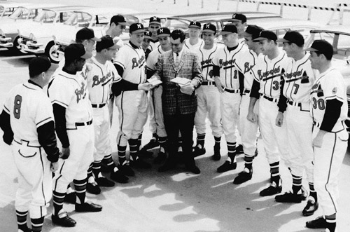 Local car dealer Wally Rank (wearing suit) annually handed out keys for brand-new cars to every Braves player, stars and benchwarmers alike. (COURTESY OF MIKE RODELL)