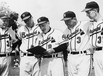 Fred Haney (2) with his Braves coaching staff (from left to right) Charlie Root, Connie Ryan, John Riddle, and Robert Keely (ROBERT KOEHLER COLLECTION)