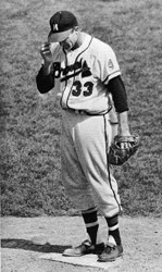 Lou Burdette was known for quick gestures to his cap, mouth, and forehead that deceived many paranoid hitters—and helped him post a 17–9 record with a 3.72 ERA in 1957. (DAVID KLUG COLLECTION)