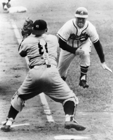 A headfirst slide by Andy Pafko (right) in the second inning of Game Six wasn’t enough to avoid the tag from Yankees catcher Yogi Berra (left). (DAVID KLUG COLLECTION)