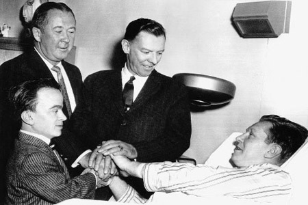 Diagnosed with tuberculosis shortly after the 1958 World Series, Red Schoendienst was visited in the hospital by (from left to right) Braves publicity director Donald Davidson, executive vice president Birdie Tebbetts, and general manager John Quinn. (DAVID KLUG COLLECTION)