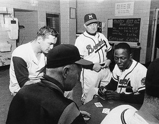 Manager Charlie Dressen (7) was never fond of the competitive card games that (left to right) Red Schoendienst, Johnny Logan, Henry Aaron, and Eddie Mathews (not pictured) played until just minutes before a ball game’s first pitch. (ROBERT KOEHLER COLLECTION)