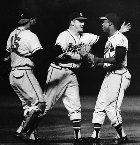 Warren Spahn celebrated with Henry Aaron and catcher Joe Torre after securing his three hundredth career victory. (ROBERT KOEHLER COLLECTION)