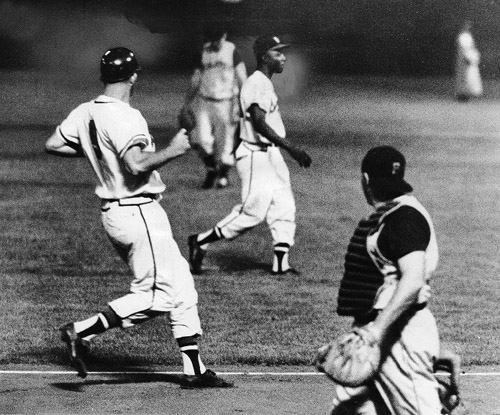 A rare base-running mistake by Henry Aaron (center) negated Joe Adcock’s (left) homer. (MILWAUKEE JOURNAL SENTINEL)