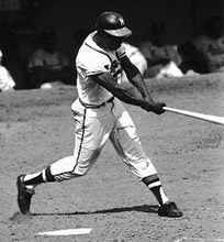 Having secured the RBI crown with 130 and connecting for his forty-fourth home run to tie Willie McCovey for the league lead, Henry Aaron almost achieved baseball’s triple crown in 1963—but he finished third in the batting race with a .319 average (behind Tommy Davis at .326 and Roberto Clemente at .320). (WHI IMAGE ID 26390)