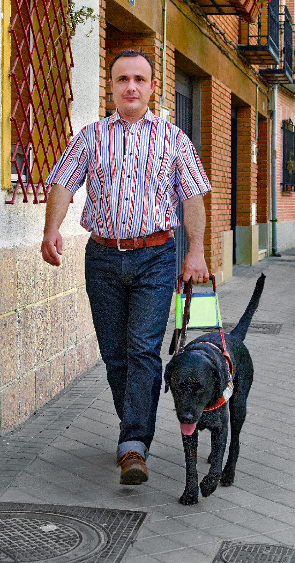 Marco Antonio and his guide dog, Dante