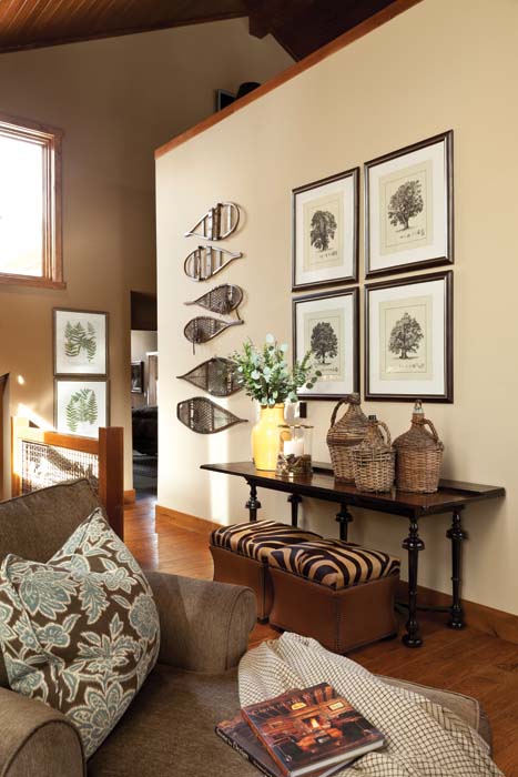 Photo of a console and a pair of Claire storage ottomans.