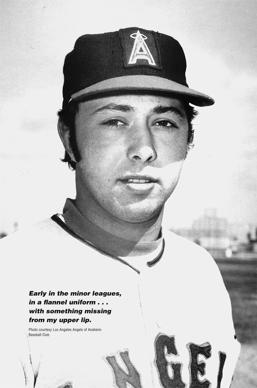 Early in the minor leagues, in a flannel uniform . . . with something missing from my upper lip. Photo courtesy Los Angeles Angels of Anaheim Baseball Club NGEL