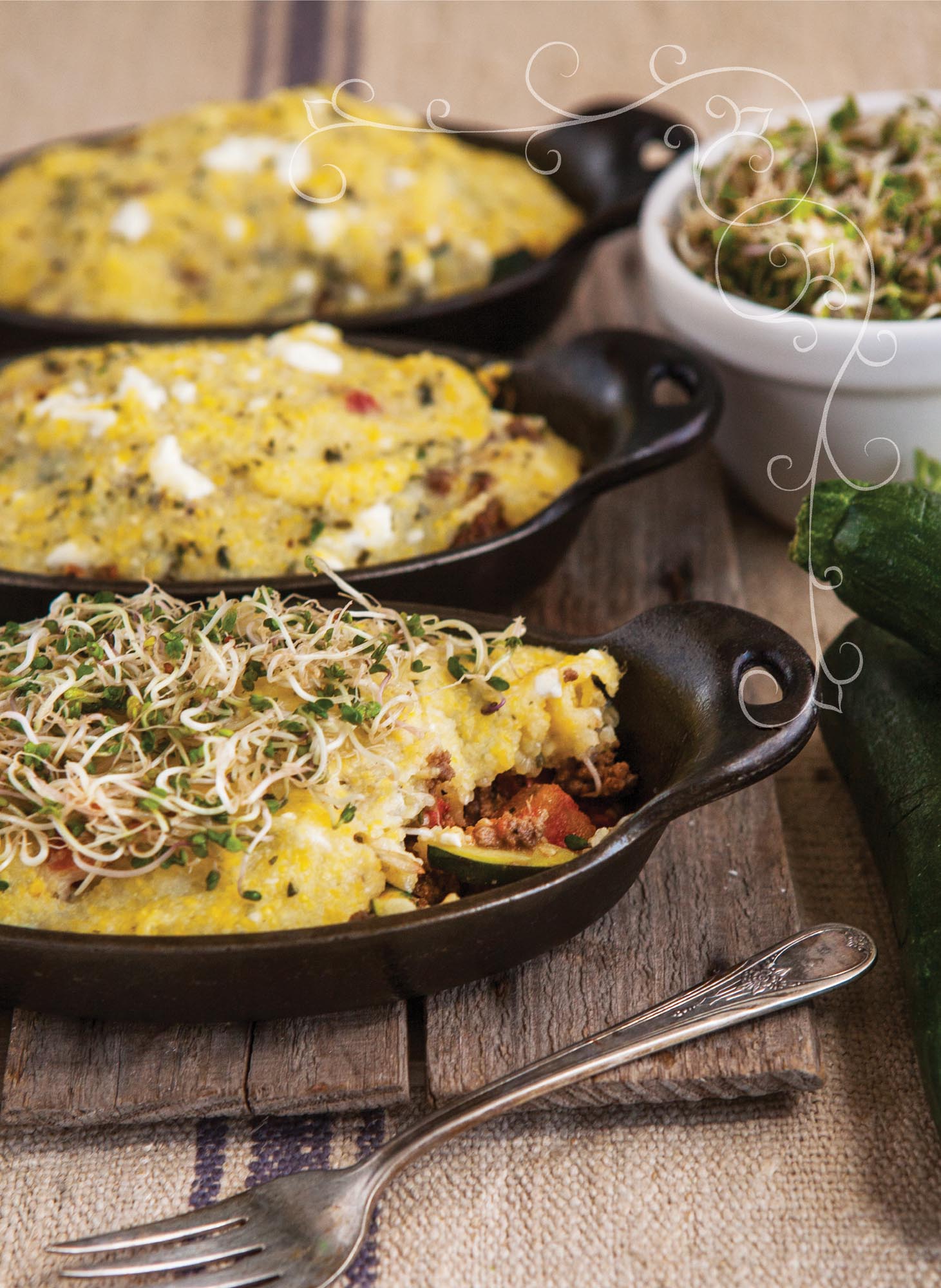 Picture of Beef, Zucchini & Polenta Mini Casseroles With Marinated Broccoli Sprouts.