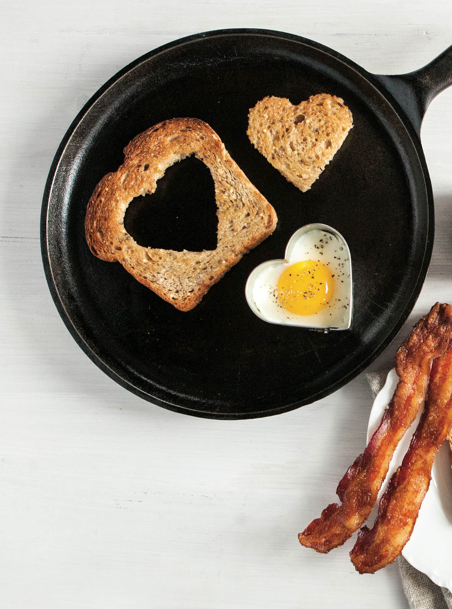 Pictures of Heart-shaped eggs in a blanket.