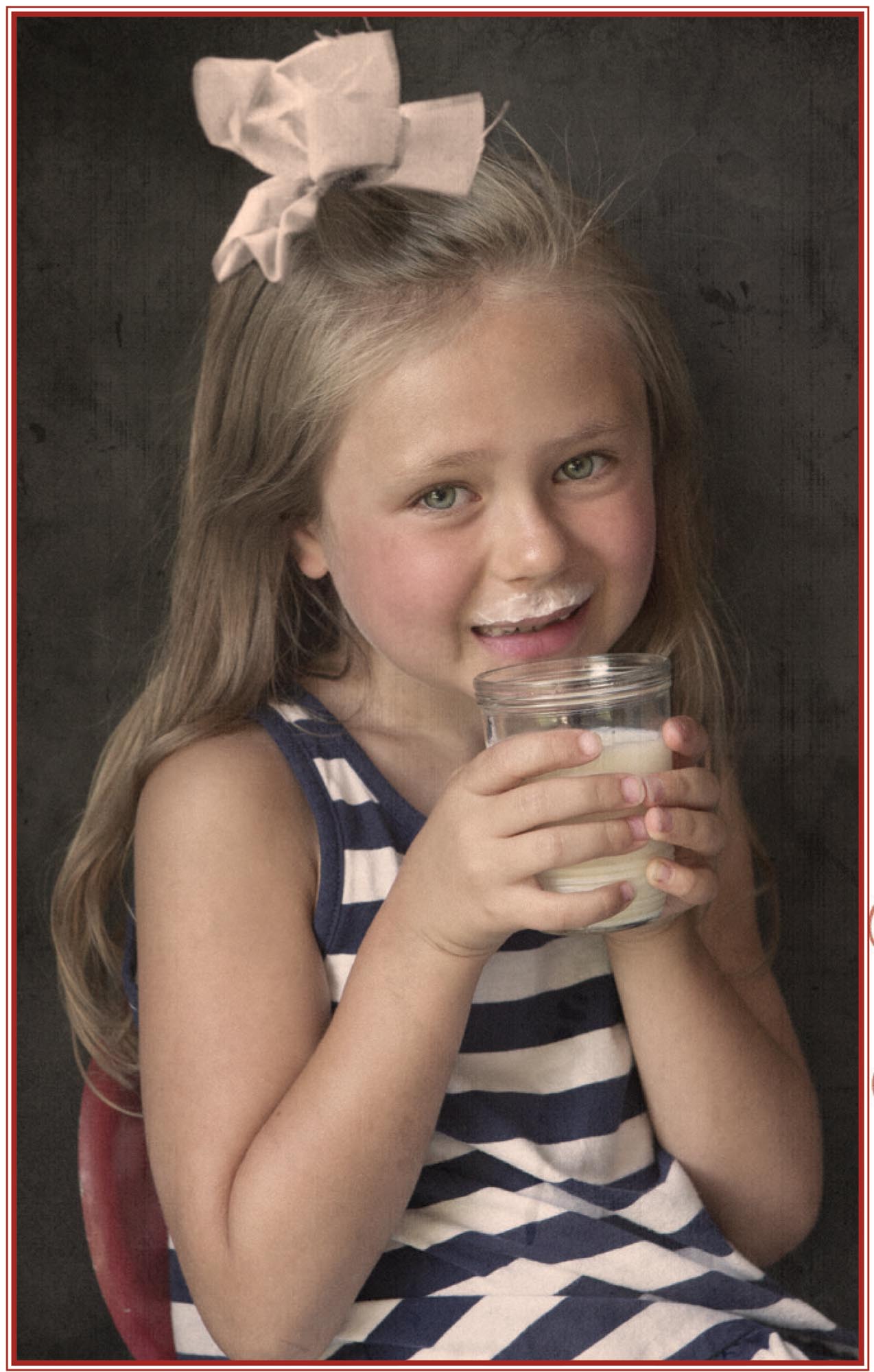 Picture of girl drinking milk.