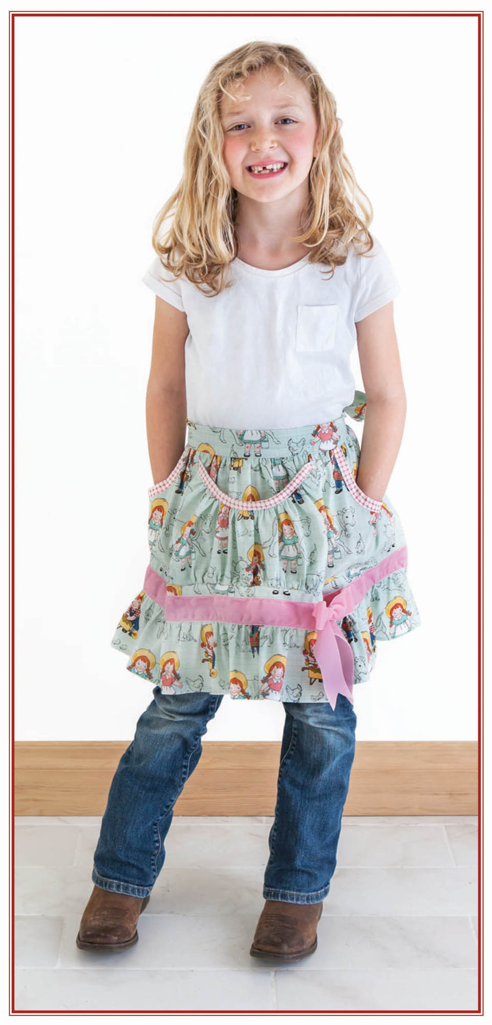 Picture of girl wearing apron.