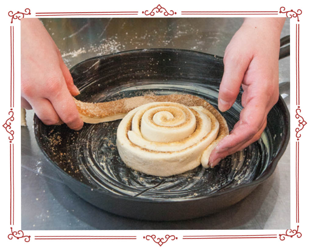 Picture of giant cinnamon roll process.