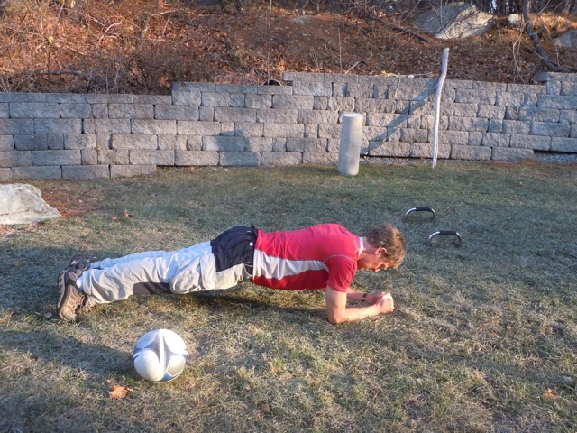 A plank outdoors in the sun