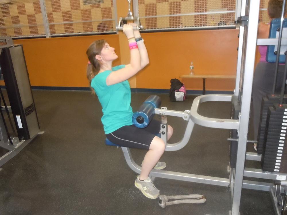 The cable pulldown strengthens the upper back