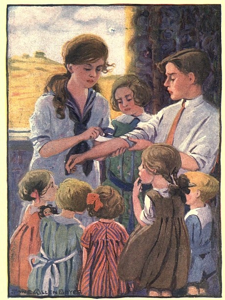 Mary Frances bandaging a boy's arm