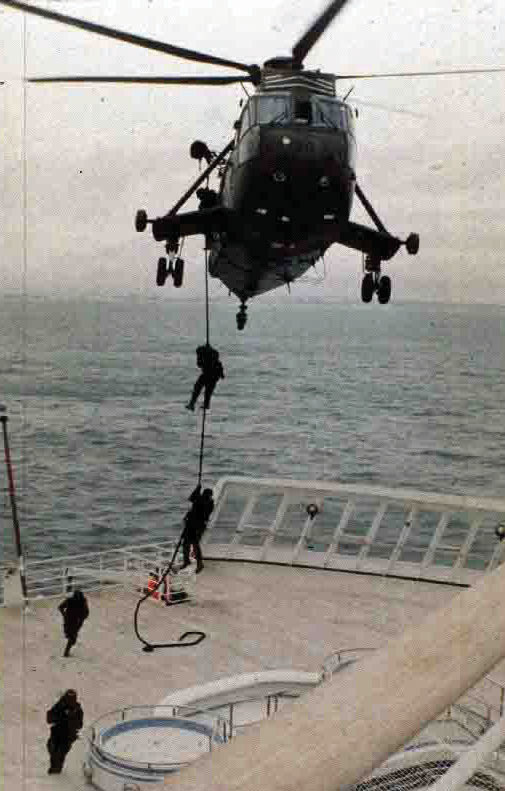 SBS/SAS operators fast rope from a Sea King helicopter onto the target ship and rush into their battle positions. Any terrorists on board will be killed or captured.