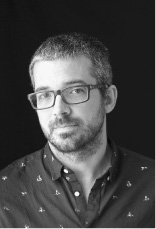 A black and white headshot of the author Matthieu Simard.