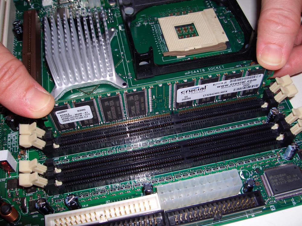 Align the memory module and press straight down until it seats