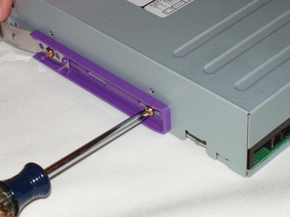 Mounting a rail on an optical drive