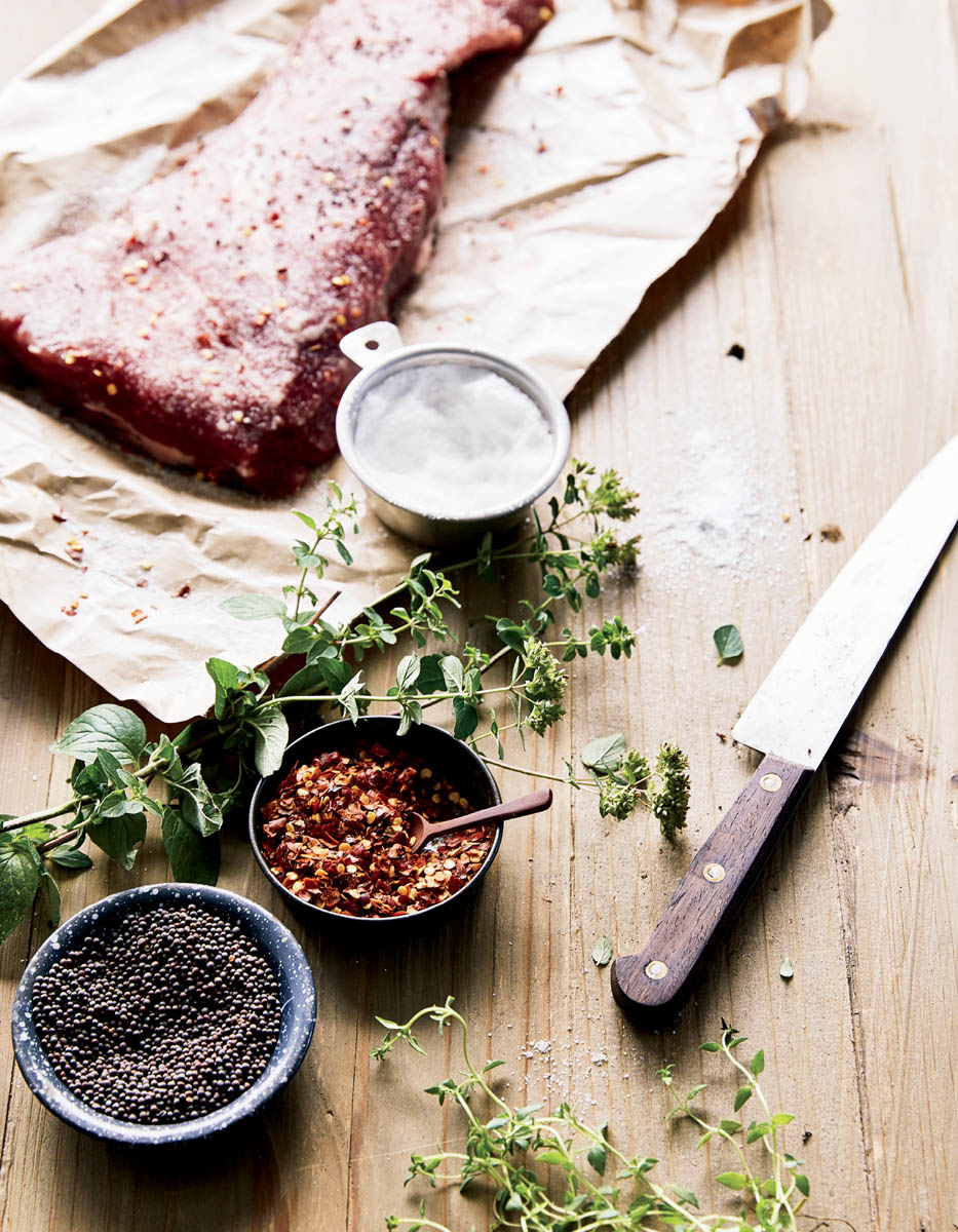 A spread of meat with herbs and seasonings for preserving.