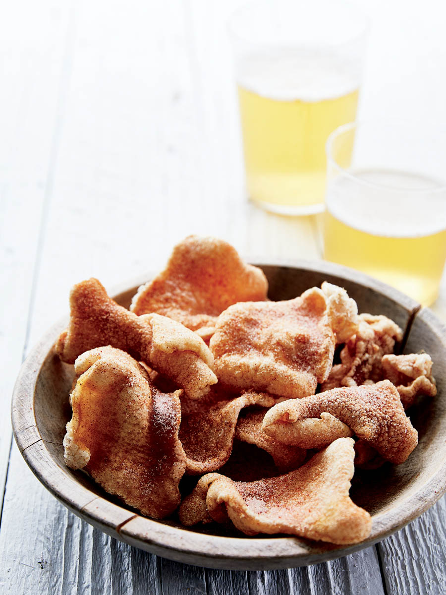 A serving bowl of pork rinds.