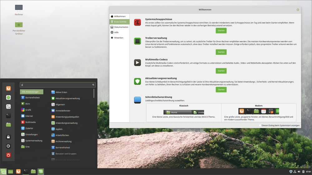 Der Cinnamon-Desktop von Linux Mint mit   dem charakteristischen Startmenü und dem Willkommensassistenten, der unter   anderem bei der Installation von Programmen, proprietären Treibern und   Multimedia-Codecs hilft.