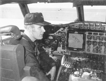 Jerry Grigsby in the cockpit of his Patrol Squadron 50 Orion after completing a nonstop flight from the naval air facility in Atsugi, Japan, to Moffett Field. The grease penciled number on the tactical plotting board in front of him indicates that the aircraft used 51,375 pounds of fuel during the trip. LOREEN GIBBONS