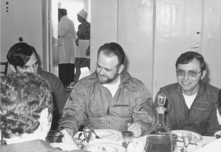 Master Chief “Inu” Shepard (center) and PO 1st Class Gary Hemmer (right, in glasses) at the farewell luncheon in the border guards’ hospital at Khabarovsk, USSR. Shepard is wearing his winter-weight flight suit. Hemmer is in a borrowed summer-weight suit. MATT GIBBONS