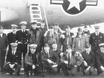 The survivors of AF 586 and Scone 92’s crew met at Eielson AFB on 2 April 1979; sixteen of them are in this picture, posed in front of Patrol Squadron 9’s PD-7. Top row, left to right: Col. Bill Perry, Lt. (jg) Bruce Forshay, Lt. Ed Caylor, PO 2d Class Ed Flow, Capt. Bob Carlson, 1st Lt. Rick Stotts, 1st Lt. Bruce Carson, Capt. Bud Irons, Capt. Bruce Salvaggio (in sun glasses), Capt. Gordie Adler, and Lt. (jg) John Ball. Kneeling, left to right: Lt. (jg) Matt Gibbons, Ens. John Wagner, Capt. Al Feldkamp, Capt. Hank Lees, Capt. Cliff Carter, Col. John Dale, and Airman Dave Reynolds. (Colonels Perry and Dale were wing officers, not members of Scone 92’s crew.) ALAN FELDKAMP