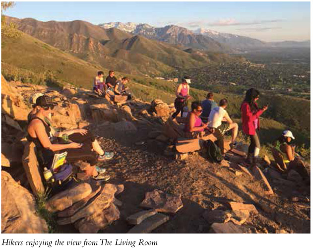 Hikers enjoying the view from The Living Room