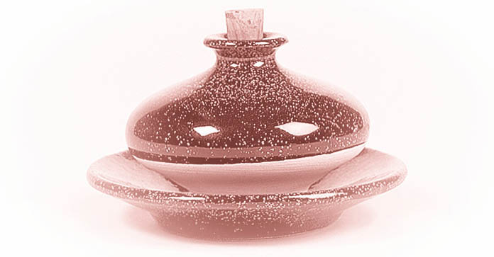 A ceramic jar for aromatic oils.