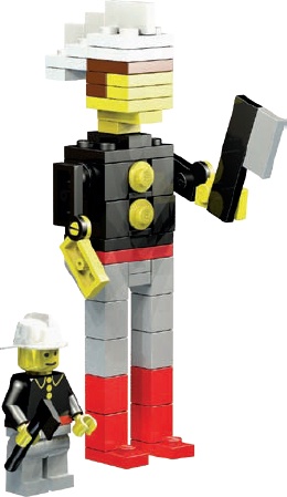 A minifig fireman and a miniland version of a similar character. The miniland man is two and one-half times as tall as his smiling minifig counterpart.