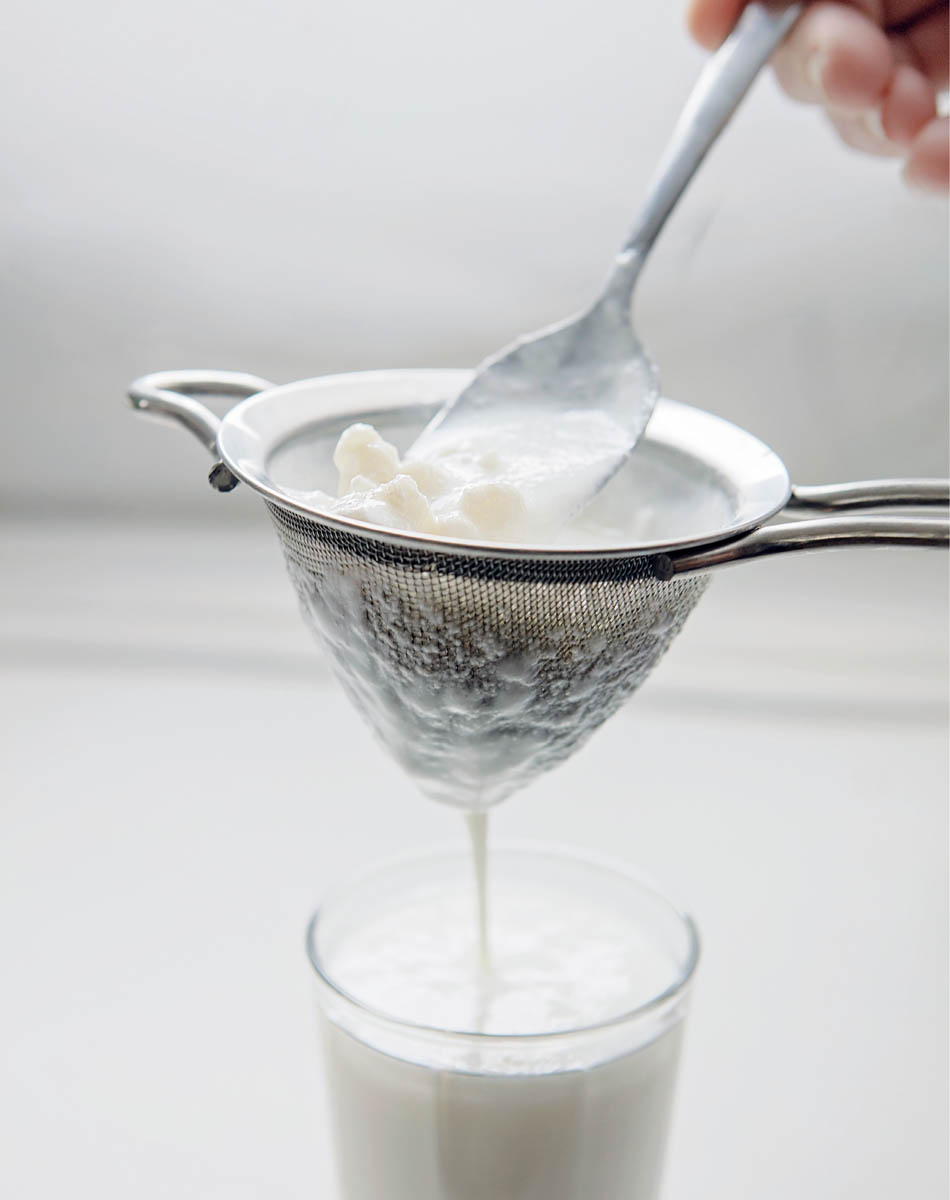 Straining kefir grains for almond kinda-kefir