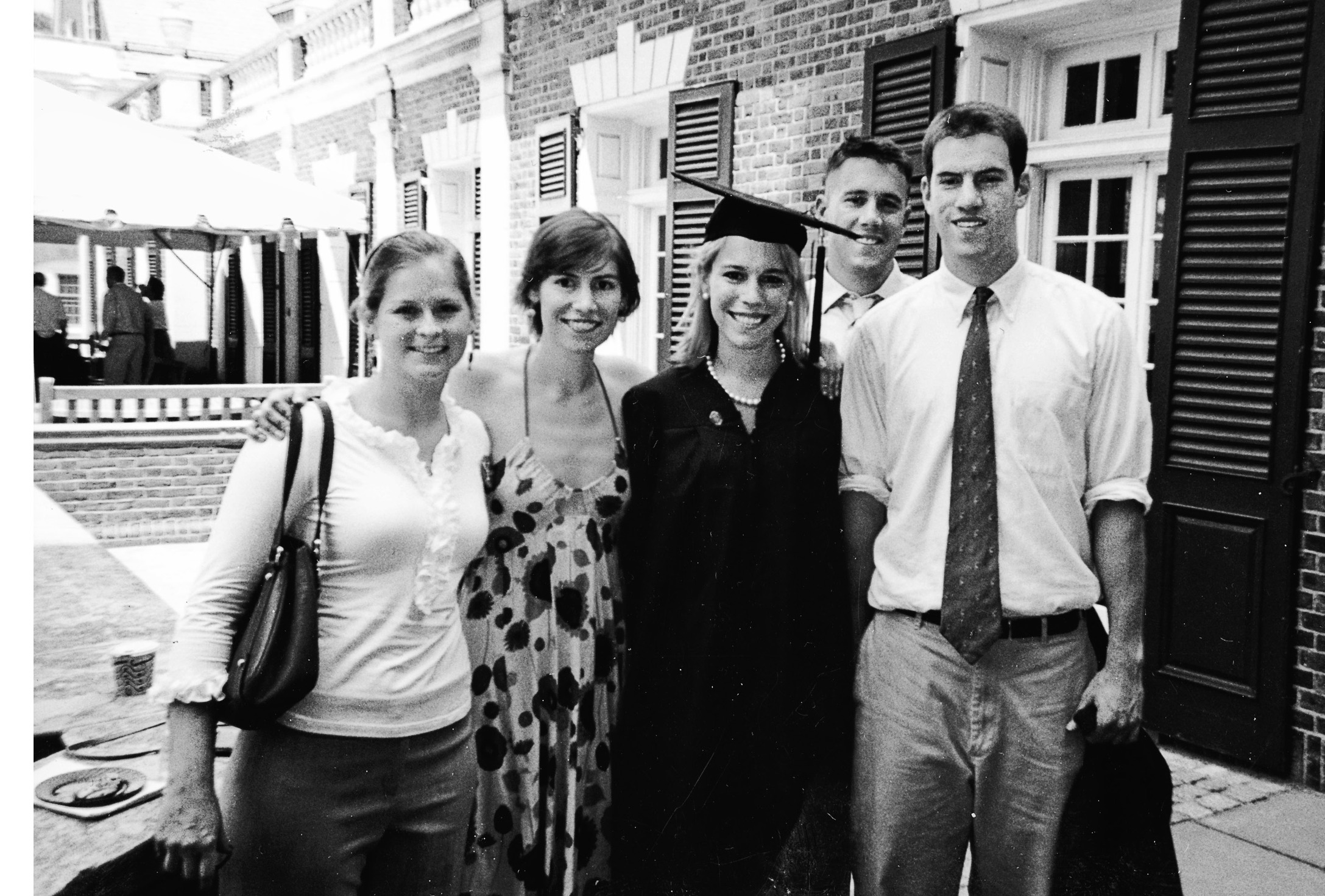 Alli with sister-in-law Emled; sister, Emily; and brothers, Teddy and Owen, on her college graduation day, May 2007.