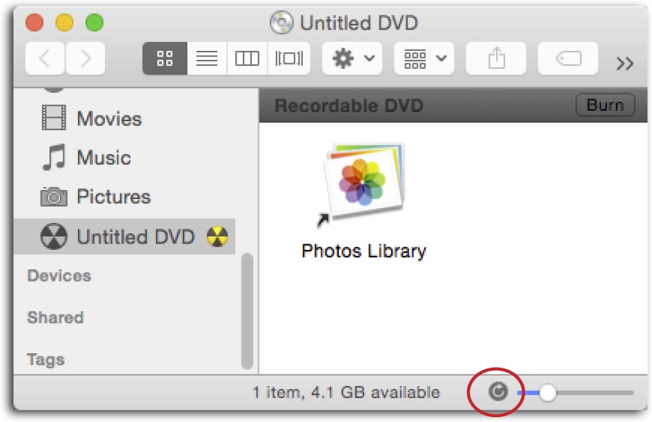 When you click the disc’s icon in the sidebar, the bottom of the window displays how much free disc space is left (if any). Here there are 4.1 gigabytes left on the DVD. Click the icon circled here to refresh the free-space amount as you add or remove files.