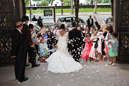 Photo of couple leaving church.