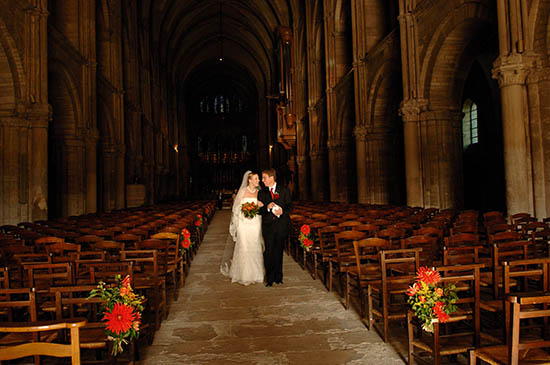 Photo of bride and groom in church.