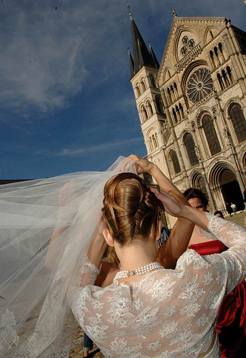 Photo of bride in front of cathedral.