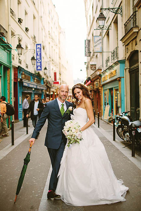 Photo of couple in street.