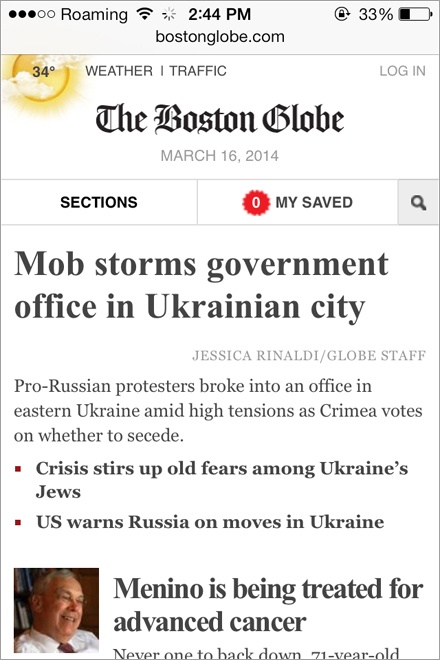 The Boston Globe site rendered in full size on an iPhone.