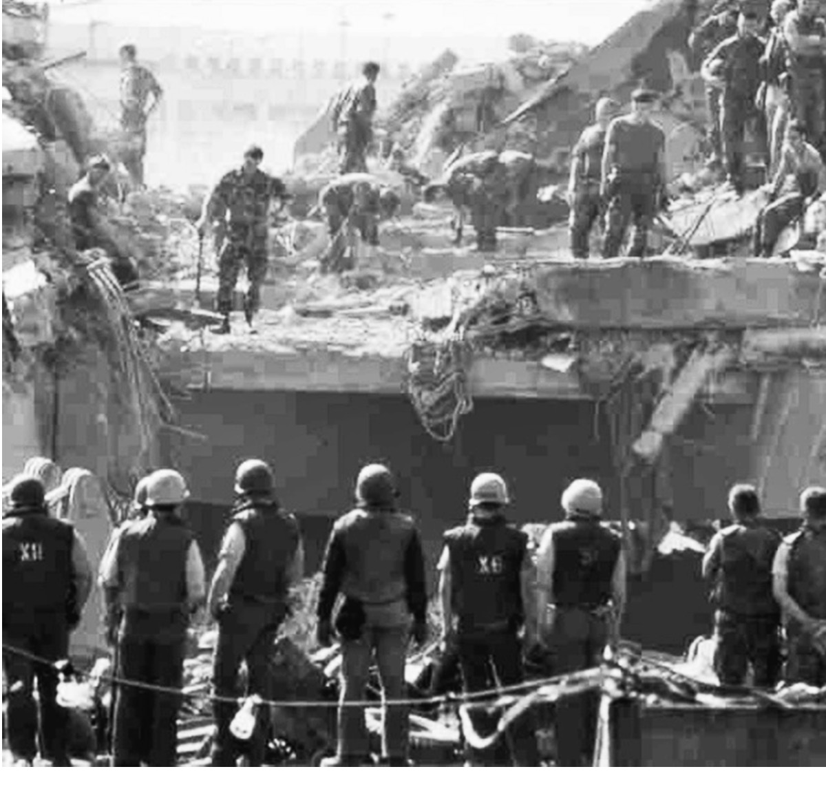 Marines survey the rubble, Beirut, 1983. With 241 Americans lost in a single day, Reagan pulls the plug.  (SSgt Randy Gaddo/US Marine Corps)