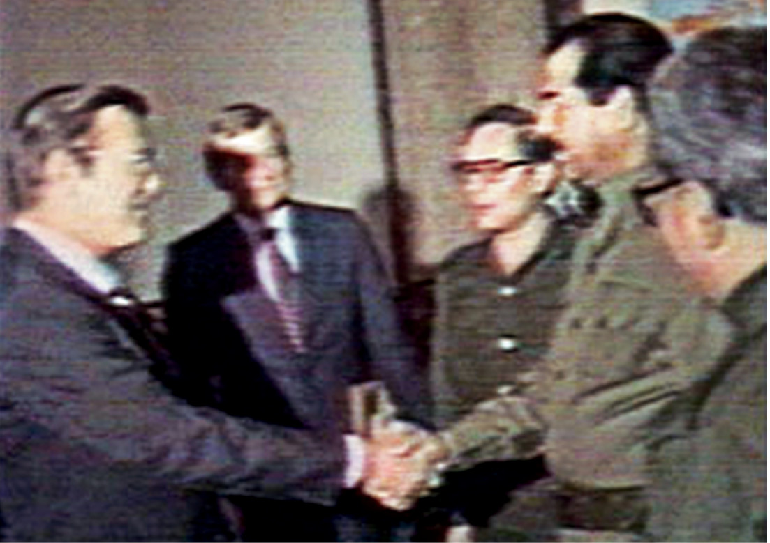 Rumsfeld in Baghdad, 1983:   The presidential envoy brings greetings from Washington.  (Iraqi TV)