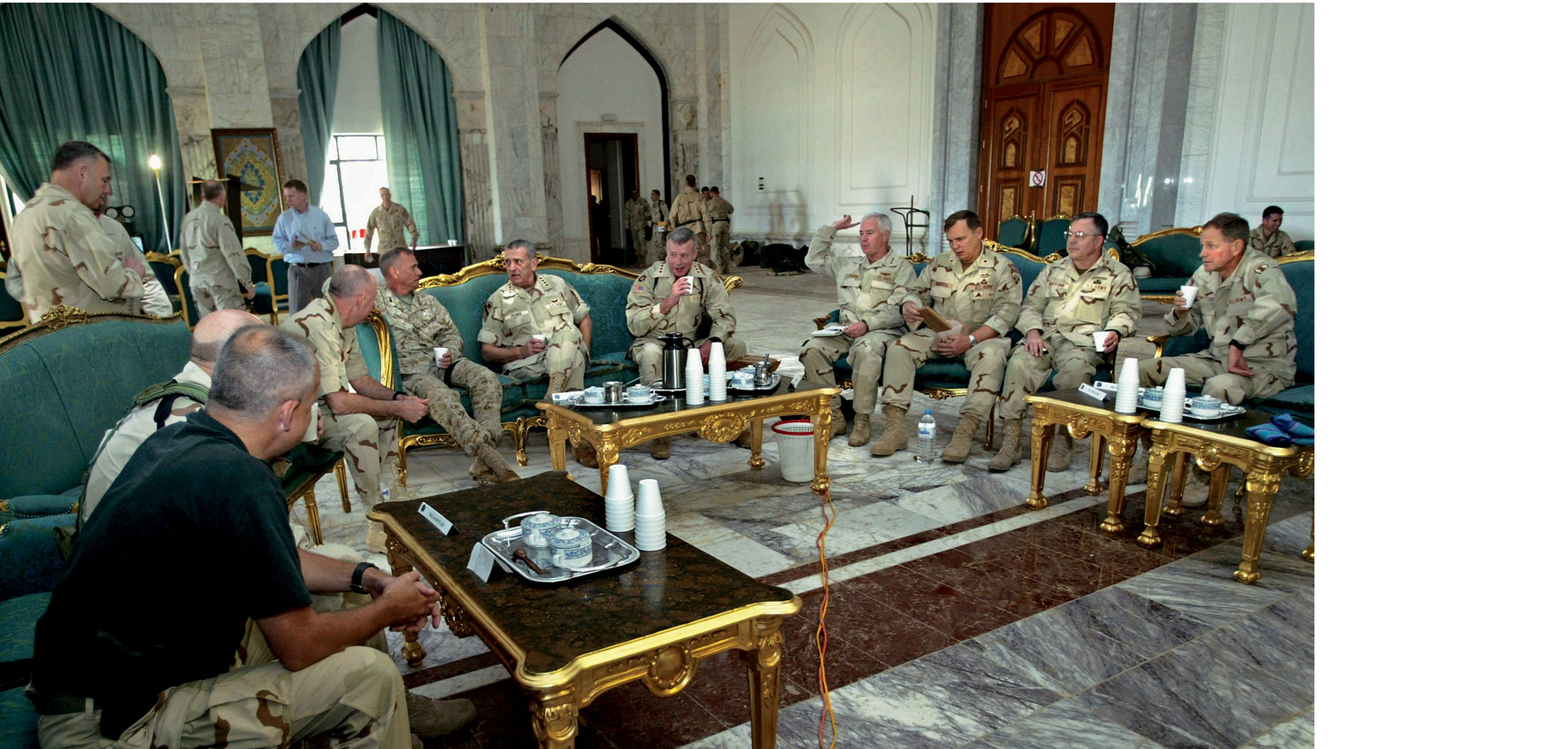 BAGHDAD, IRAQ - APRIL 16:  U.S. Gen. Tommy Franks meets with Iraqi war commanders in a palace of Saddam Hussein's April 16, 2003 in Baghdad, Iraq. The four-star general, who directed the coalition invasion of Iraq, flew into Baghdad for a progress report.  (Photo by Karen Ballard-Pool/Getty Images)