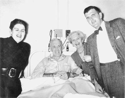 Image of The family visits the Colonel in hospital