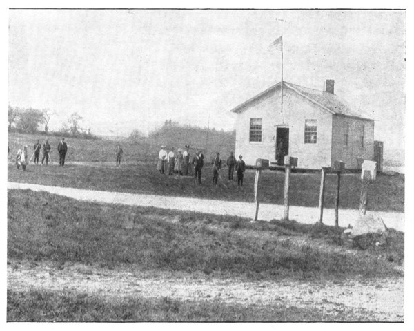 Fig. 2. Junior Gardeners at work in a New York school ground. The grounds are now ready for planting. The mail carrier now calls and the pupils take the mail home.