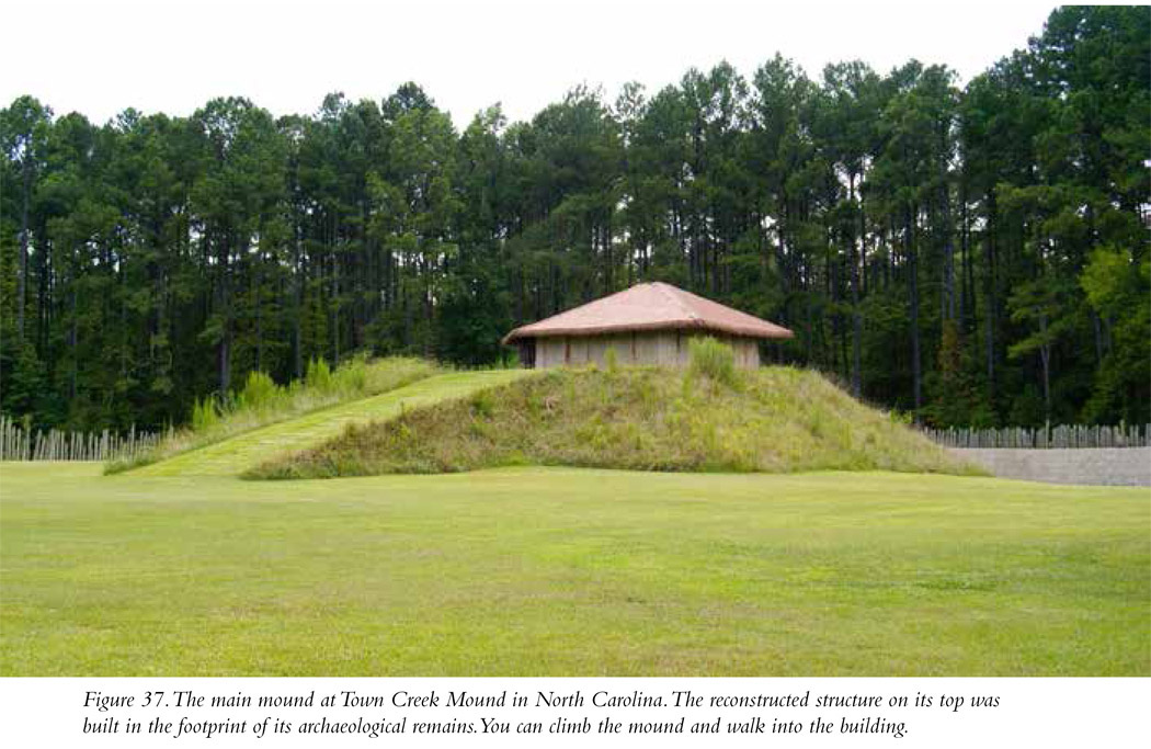 Figure 37. The main mound at Town Creek Mound in North Carolina. The reconstructed structure on its top was built in the footprint of its archaeological remains. You can climb the mound and walk into the building.